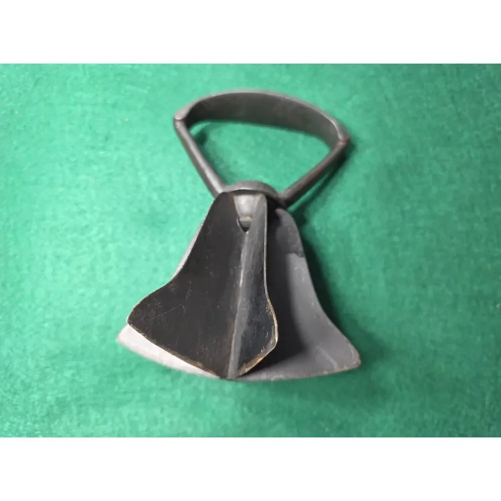 Vintage handheld metal food chopper bell-shaped cast iron handle